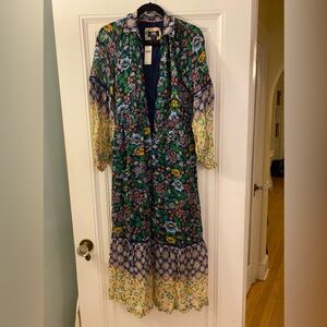 NWT mauve brand dress size small. Long cuffed sleeves